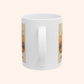 White mug with printed design on a white background