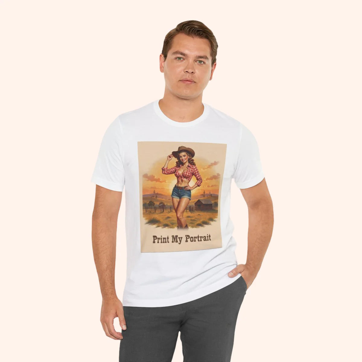 Man wearing a white t-shirt with a graphic of a woman in a cowboy hat and text 'Print My Portrait' on a plain background